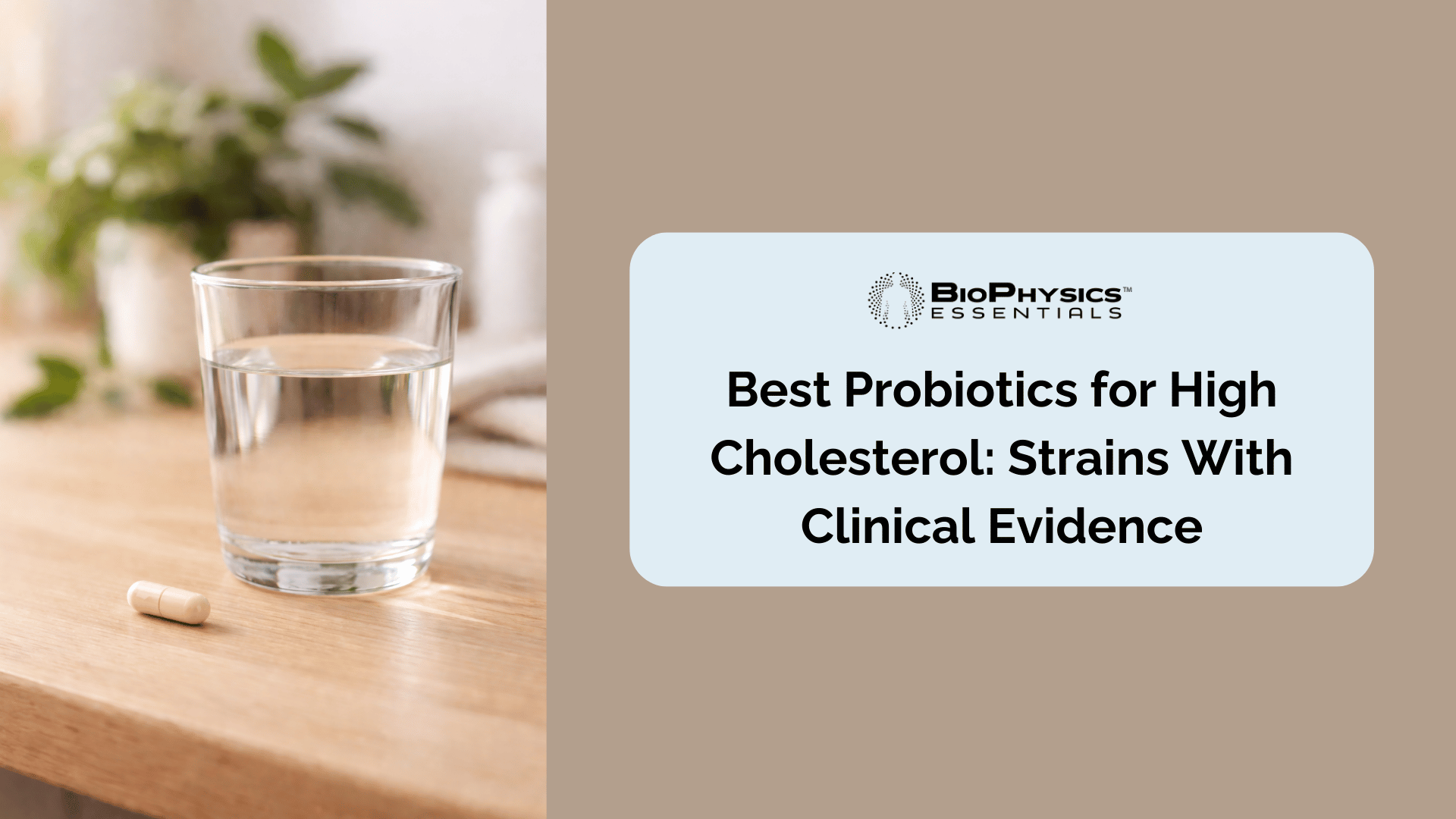 A white probiotic capsule beside a glass of water on a natural wood surface, representing daily supplement use for heart and gut health