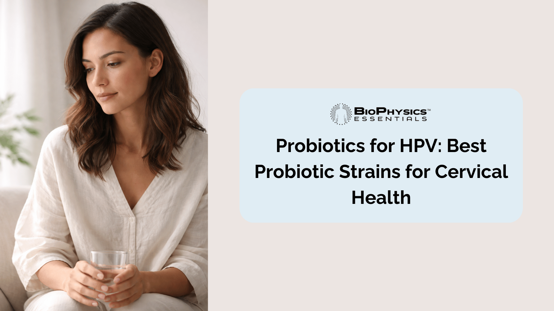 Woman sitting in natural window light in a calm home setting representing a thoughtful approach to cervical health and probiotic supplementation for HPV support